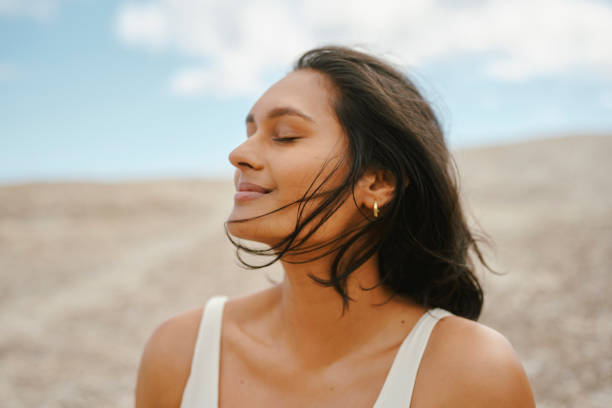 Woman enjoying healthy radiant skin in all seasons